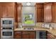 Well-appointed kitchen featuring stainless steel appliances, granite countertops, and ample cabinet space at 1500 Lynway Dr, Charlotte, NC 28203