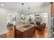 Spacious kitchen island with a gas cooktop in an open layout at 1500 Lynway Dr, Charlotte, NC 28203