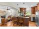 Gourmet kitchen with granite countertops, stainless steel appliances, and a central island with seating at 1500 Lynway Dr, Charlotte, NC 28203