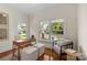 Cozy office with a large window offering abundant natural light and views of the front porch at 1500 Lynway Dr, Charlotte, NC 28203