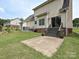Backyard featuring a patio, grassy area, and the home's exterior at 1505 Wimbleton Woods Dr # 5, Fort Mill, SC 29708