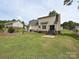 Backyard featuring a patio, grassy area, and the home's exterior at 1505 Wimbleton Woods Dr # 5, Fort Mill, SC 29708