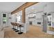 Open kitchen with a large island, bar stool seating, and stainless steel appliances at 15737 Agincourt Dr, Huntersville, NC 28078