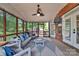 Cozy screened porch features comfortable seating, wood accents, and an open view of the outdoor space at 15737 Agincourt Dr, Huntersville, NC 28078