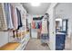 Walk-in closet with custom built-in shelving and storage, with ample room to hang clothes at 15737 Agincourt Dr, Huntersville, NC 28078