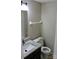 Half bath with granite countertop and updated faucet at 1604 Arlyn Cir # E, Charlotte, NC 28213