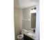 Cozy bathroom featuring granite countertops, modern vanity, and essential fixtures at 1604 Arlyn Cir # E, Charlotte, NC 28213