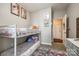 Well-lit bedroom featuring a bunk bed and neutral decor at 1648 Jonesberry Dr, Rock Hill, SC 29732