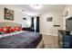 bedroom featuring a bed with character-themed bedding and entertainment center with a wall-mounted TV at 1648 Jonesberry Dr, Rock Hill, SC 29732