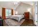 Comfortable bedroom with high ceilings, hardwood floors, and bright natural light at 1648 Jonesberry Dr, Rock Hill, SC 29732