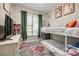 Charming bedroom featuring a bunk bed, colorful rug, and bright natural light at 1648 Jonesberry Dr, Rock Hill, SC 29732