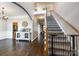 Inviting entryway with hardwood floors, staircase, and decorative furnishings leading to the upper level at 1648 Jonesberry Dr, Rock Hill, SC 29732