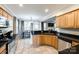 Well-equipped kitchen featuring granite countertops, stainless steel appliances, and an open layout to the dining area at 1648 Jonesberry Dr, Rock Hill, SC 29732
