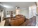 Spacious living room with hardwood floors, cozy leather sofas, and built-in bookshelves at 1648 Jonesberry Dr, Rock Hill, SC 29732