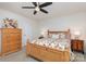 Cozy bedroom featuring natural wood furnishings and floral accents at 1659 Loggerhead Dr, Lancaster, SC 29720