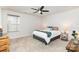 Comfortable bedroom with a ceiling fan, window, and neutral-colored carpet at 1659 Loggerhead Dr, Lancaster, SC 29720