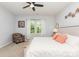 Cozy main bedroom with ceiling fan and a large window at 1659 Loggerhead Dr, Lancaster, SC 29720