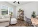 Well-lit home office with modern chair and built-in shelving at 1659 Loggerhead Dr, Lancaster, SC 29720