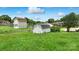 Spacious backyard features two storage sheds at 1735 Hollandale Dr, Gastonia, NC 28054