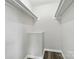 A walk-in closet with built-in shelving provides ample storage space at 1735 Hollandale Dr, Gastonia, NC 28054