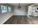 Bright dining area with new flooring, modern lighting, and a large window offering pleasant views at 1735 Hollandale Dr, Gastonia, NC 28054