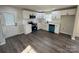 Updated kitchen with white cabinetry, stainless appliances, and subway tile, offering a clean and modern feel at 1735 Hollandale Dr, Gastonia, NC 28054