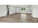 Bright, open living room with fresh paint and modern flooring ready for new owners at 1735 Hollandale Dr, Gastonia, NC 28054