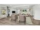 Bright living room with hardwood floors, neutral decor, and a comfortable seating arrangement at 1735 Hollandale Dr, Gastonia, NC 28054