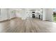 Spacious open floorplan featuring modern flooring and seamless transitions between living spaces at 1735 Hollandale Dr, Gastonia, NC 28054