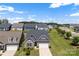 Charming home with stone accents, a manicured lawn, and an attached two car garage at 19004 Dry Narrows Way, Charlotte, NC 28278
