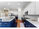 Modern kitchen featuring white cabinets, stainless steel appliances, and stylish countertops at 19004 Dry Narrows Way, Charlotte, NC 28278