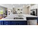 Stylish kitchen island with white countertop and stainless steel appliances at 19004 Dry Narrows Way, Charlotte, NC 28278