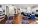 Spacious living area featuring hardwood floors leading into a gourmet kitchen with a stylish island at 19004 Dry Narrows Way, Charlotte, NC 28278