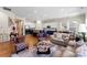 Spacious living room with a view of kitchen, hardwood floors, and comfortable seating at 19004 Dry Narrows Way, Charlotte, NC 28278