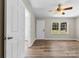 Living room with neutral walls and a ceiling fan at 2009 Auten Rd, Gastonia, NC 28054