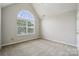 Bedroom with neutral walls, carpet, window and trim at 2028 Covered Bridge Ct, Rock Hill, SC 29732