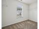 Bedroom with neutral carpet, window with blinds, and closet storage at 2028 Covered Bridge Ct, Rock Hill, SC 29732