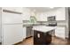 Modern kitchen with stainless steel appliances, granite countertops, and an island at 205 E Cleveland Ave, Bessemer City, NC 28016