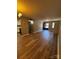 Spacious living room boasts wood flooring and natural light at 2106 S Main St, Kannapolis, NC 28081