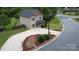 Aerial view of home with well-maintained landscaping, gravel driveway, and lush green surroundings at 212 Old Centergrove Rd, Kannapolis, NC 28083