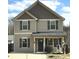 Charming two-story home with gray siding and inviting front porch at 212 Old Centergrove Rd, Kannapolis, NC 28083