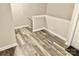 Hallway area featuring clean neutral-colored walls and hardwood floors, offering a modern space at 212 Old Centergrove Rd, Kannapolis, NC 28083