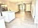 Inviting living room with an island, hardwood floors, a large window, and ample natural light at 212 Old Centergrove Rd, Kannapolis, NC 28083