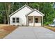 Charming single-story home with white siding and a cozy front porch at 217 E Division Ave, Salisbury, NC 28144