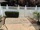 Backyard patio with gravel landscaping, a privacy fence, and easy outdoor living at 228 Dawn Mist Ln, Fort Mill, SC 29708