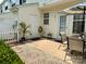 Private backyard patio with a table, chairs, and well-maintained landscaping for outdoor relaxation at 228 Dawn Mist Ln, Fort Mill, SC 29708