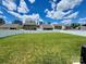 Expansive backyard with lush green grass and a white fence, perfect for outdoor activities at 2311 Verde Creek Rd, Charlotte, NC 28214