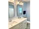 Well lit bathroom with blue walls, a double sink and a toilet at 2311 Verde Creek Rd, Charlotte, NC 28214