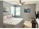Bright bedroom with natural light, ceiling fan, and neutral paint at 2311 Verde Creek Rd, Charlotte, NC 28214