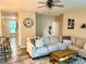 Spacious living room with a large comfortable sofa, decorative rug, and access to other rooms at 2311 Verde Creek Rd, Charlotte, NC 28214